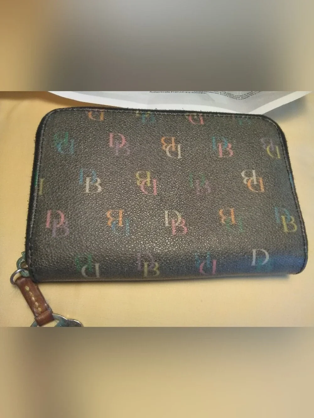 Lo. New Dooney & Bourke Black Pebbled Zip Wallet W/ Rainbow DB Monogram